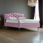 Purple designer storage bed with tufted headboard in grey room with chandelier